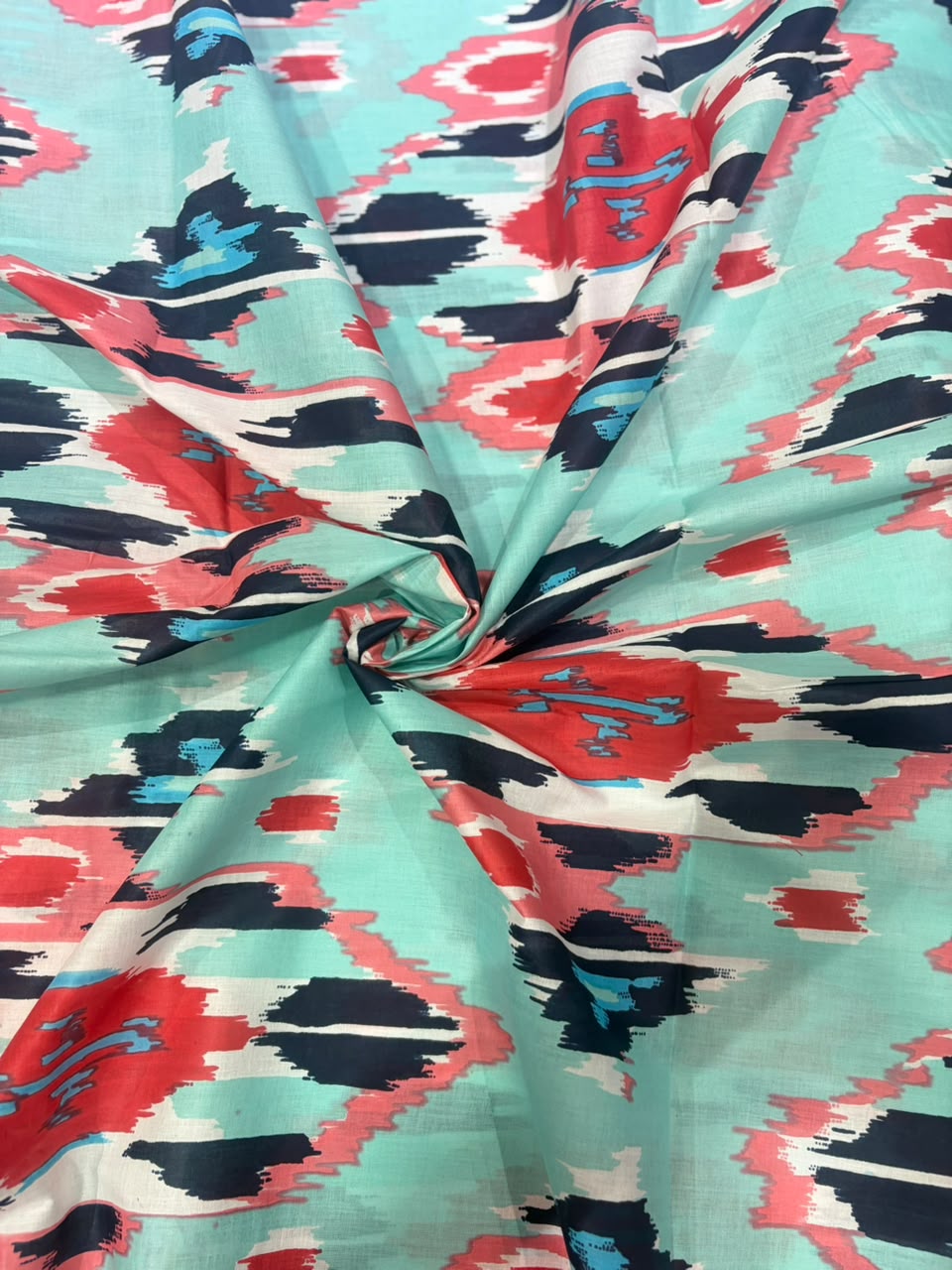 Mint Green & Coral Red Abstract Ikat Printed Pure Cotton Fabric
